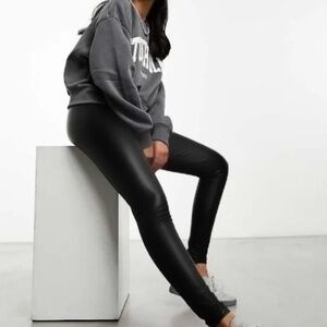 Super sexy leggings faux leather  Size small 85% polyester  10%PU 5% spandex